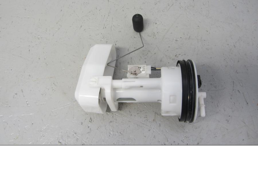 Framsidan på Bensinpump insprut från en Suzuki LTA 750 XP E -2009 motorcykel.