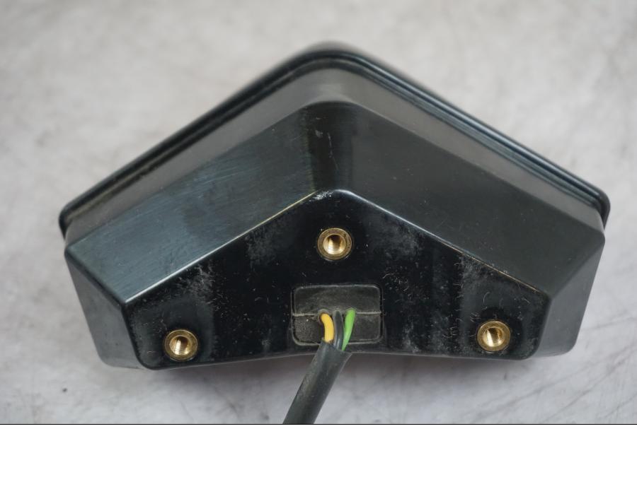 Snett nerifrån på Baklampa från en Triumph Tiger -2009 motorcykel.