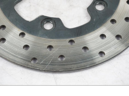 Baksidan på Bromsskiva från en Suzuki GSX-R 750 -2002 motorcykel.