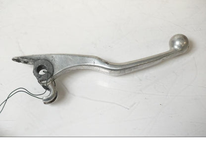 Framsidan på <p>Bromsgrepp från Husqvarna TE 310 2009.</p>

<p>Mindre skrapmärken på knoppen samt ytliga repor se bilder.</p> motorcykel.