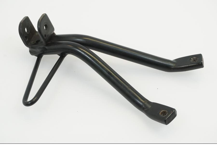 Höger sida på Fotpinnefäste från en Yamaha WR 125 -2010 motorcykel.