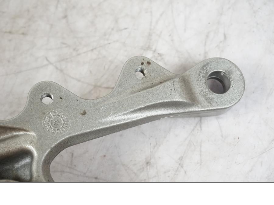 Snett uppifrån på Fotpinnefäste från en Kawasaki ZX-6R -2006 motorcykel.