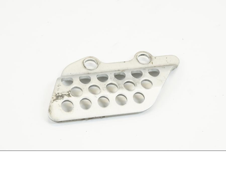 Höger sida på Fotpinnehälskydd från en Kawasaki ZX-12R -2000 motorcykel.