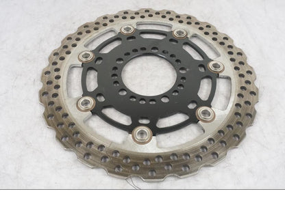 Framsidan på Bromsskiva från en Kawasaki Versys 1000 -2016 motorcykel.