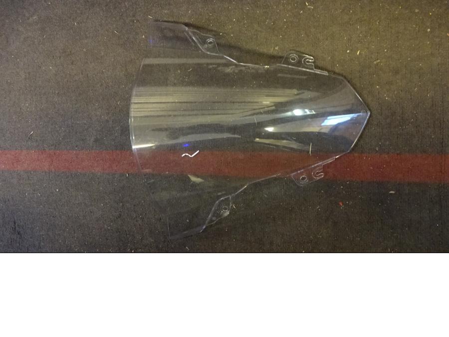 Framsidan på Vindruta från en BMW S 1000 RR -2015 motorcykel.