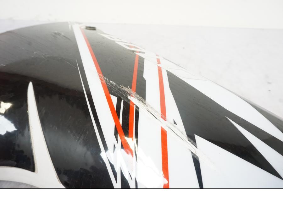 Snett uppifrån på Sidkåpa från en Yamaha YZF-R 125 -2008 motorcykel.