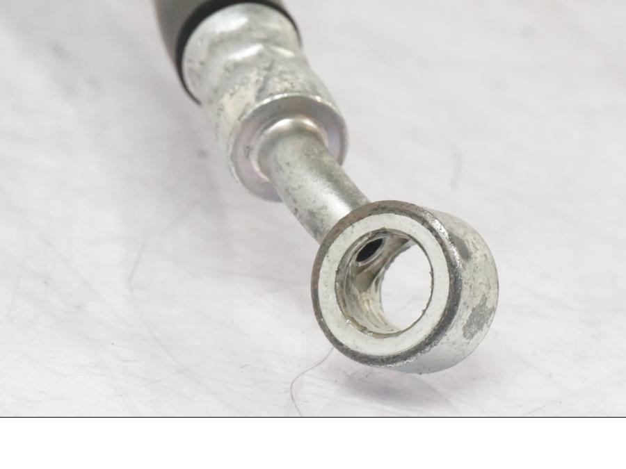 Baksidan på Kopplingsledning från en Suzuki GSF 1250 -2010 motorcykel.