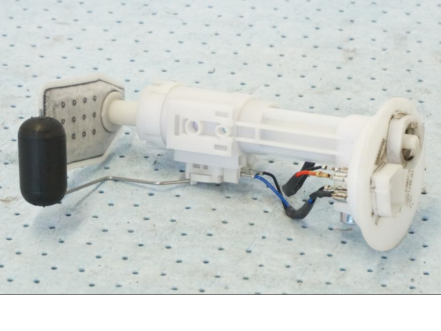 Baksidan på Bensinpump insprut från en Yamaha X-Max 250 -2016 scooter.