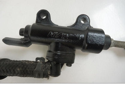 Baksidan på Bromshuvudcylinder från en Honda XL 1000 V -2008 motorcykel.