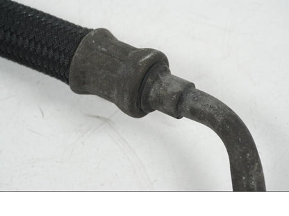 Snett uppifrån på Oljekylslang från en Yamaha XT 660 X -2005 motorcykel.