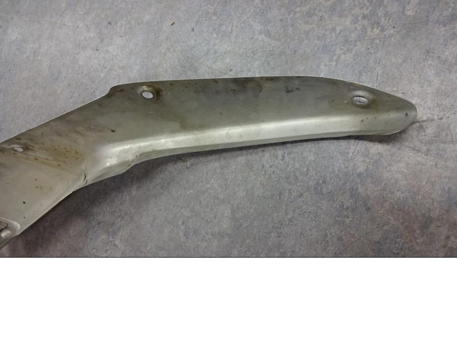 Snett uppifrån på Ljuddämpardekor från en Honda CB 1000 R -2009 motorcykel.