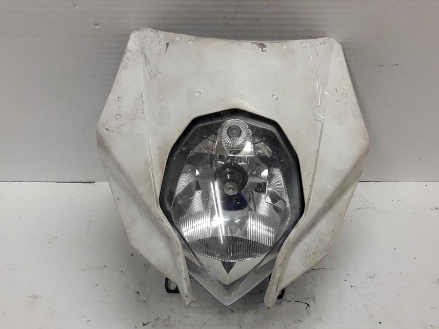 Framsidan på Strålkastare från en Husqvarna TE 630 -2011 motorcykel.