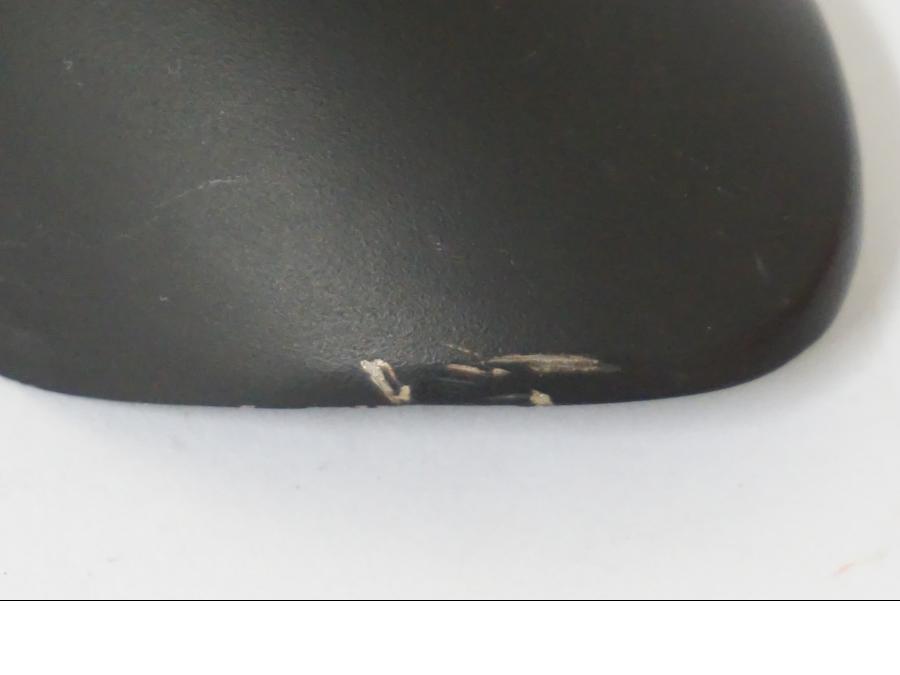 Vänster sida på Värmeskydd från en Buell 1125 CR -2009 motorcykel.