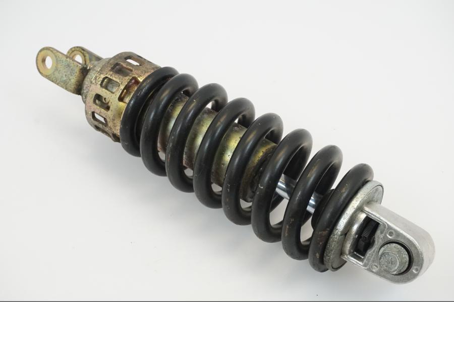 Framsidan på <p>Stötdämpare från Suzuki GSX-R 600 Corona 2000.</p>

<p>Okej skick, justerbar. C/C mått: ca 300mm.</p> motorcykel.