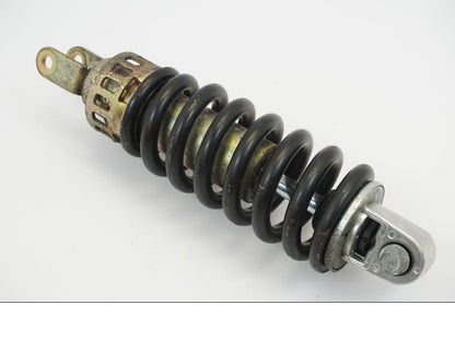 Framsidan på <p>Stötdämpare från Suzuki GSX-R 600 Corona 2000.</p>

<p>Okej skick, justerbar. C/C mått: ca 300mm.</p> motorcykel.