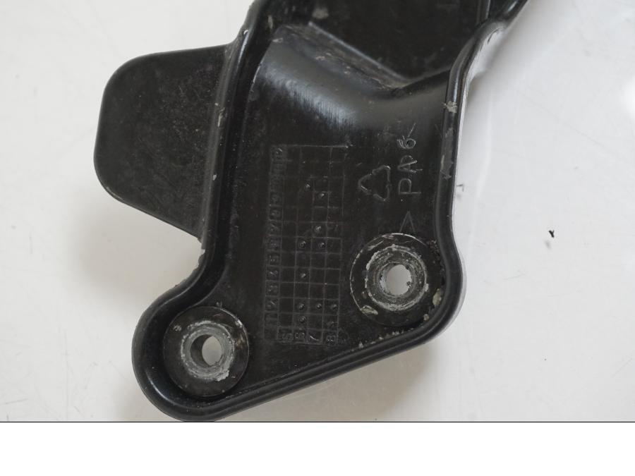 Extrabild1 på Fotpinnehälskydd från en Aprilia RS 125 -2008 motorcykel.