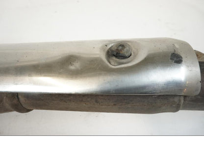 Vänster sida på Ljuddämpare från en Honda XL 1000 V -2008 motorcykel.