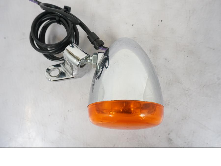 Vänster sida på Blinkers från en H-D Softail Sport Glide FLSB -2022 motorcykel.