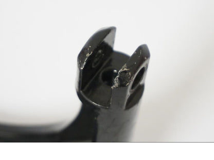 Snett uppifrån på Fotpinnefäste från en H-D Softail -2004 motorcykel.