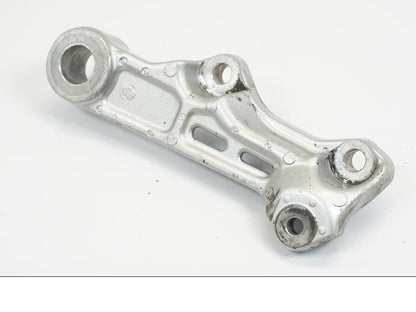 Framsidan på Bromsoksfäste från en Yamaha TRX 850 -1997 motorcykel.