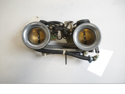 Vänster sida på Spjällhus från en Ducati 748 -2001 motorcykel.