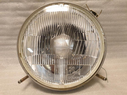 Framsidan på Strålkastarinsats från en Yamaha XV 1600 -2002 motorcykel.