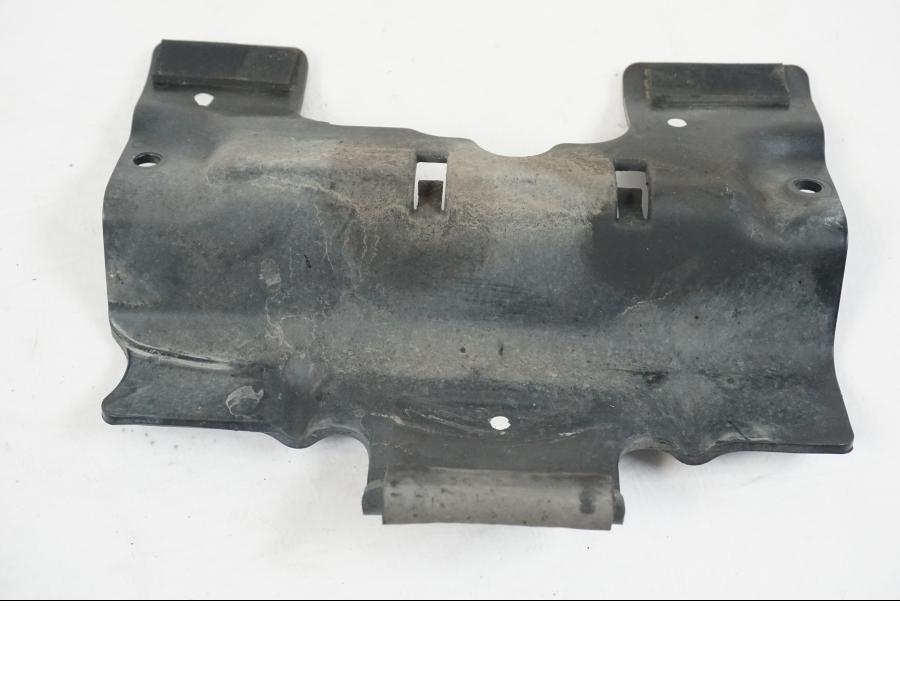 Vänster sida på Värmeskydd från en Kawasaki ER-6F -2010 motorcykel.