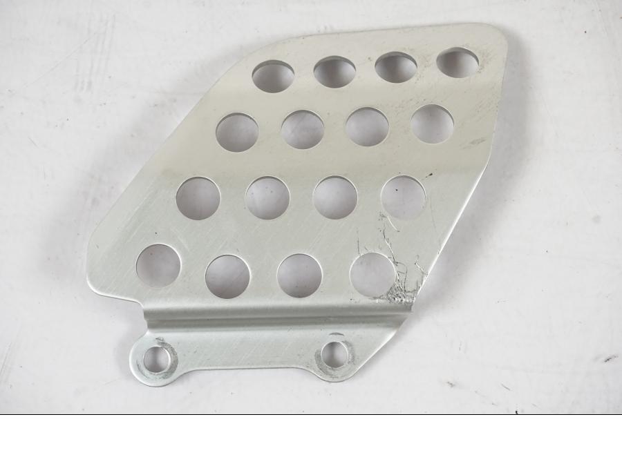 Framsidan på Fotpinnehälskydd från en Honda CBR 1000 RR -2007 motorcykel.