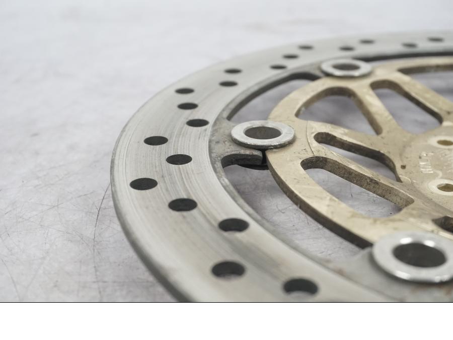 Vänster sida på Bromsskiva från en Honda VFR 800 -1998 motorcykel.