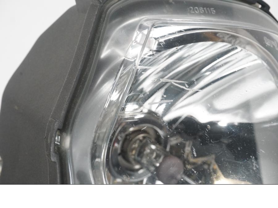 Snett nerifrån på Strålkastare från en KTM 690 SM -2007 motorcykel.