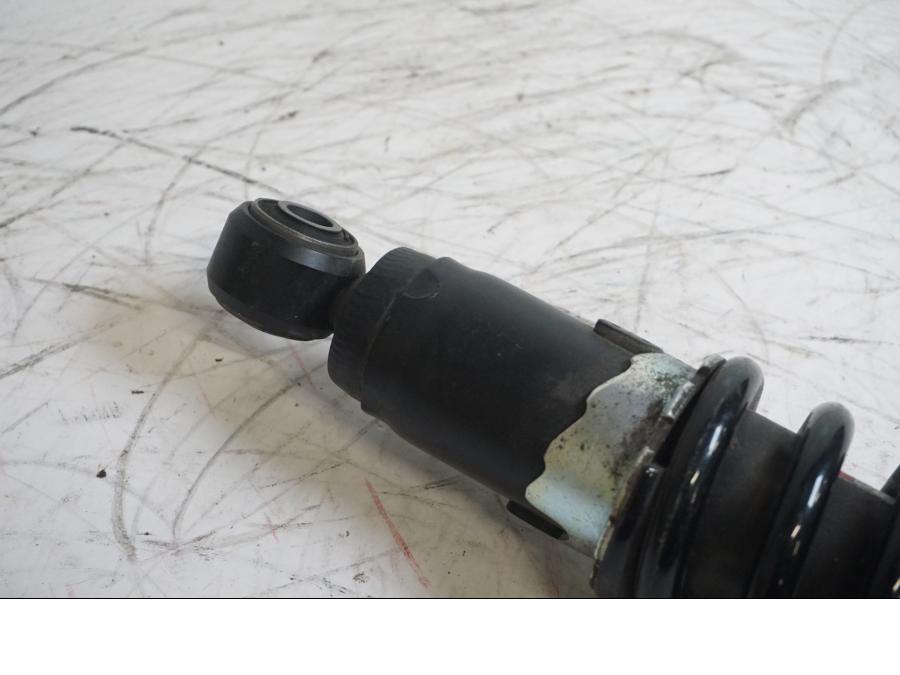 Vänster sida på Stötdämpare från en Kawasaki Ninja 300 -2014 motorcykel.