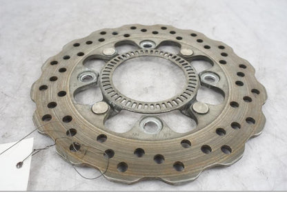 Höger sida på Bromsskiva från en Kawasaki ER-6N -2014 motorcykel.