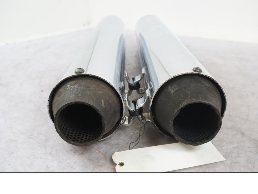 Vänster sida på Ljuddämpare från en H-D Fat Boy -2010 motorcykel.