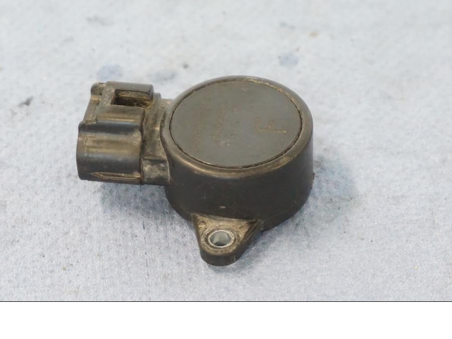 Baksidan på TPS från en Yamaha X-Max 250 -2016 scooter.