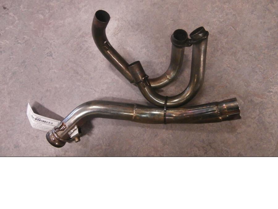 Baksidan på Grenrör från en Husaberg FE 02 -2004 motorcykel.