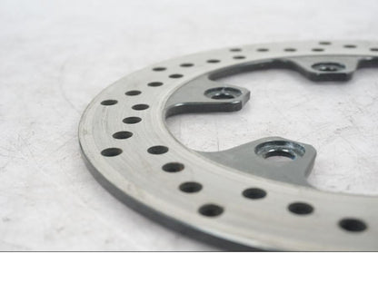 Baksidan på Bromsskiva från en Suzuki SV 1000 -2004 motorcykel.