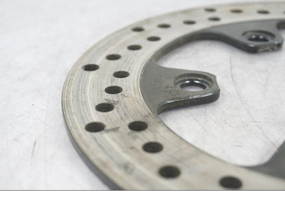 Vänster sida på Bromsskiva från en Suzuki SV 650 -2006 motorcykel.