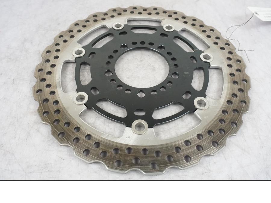 Höger sida på Bromsskiva från en Kawasaki Versys 1000 -2016 motorcykel.