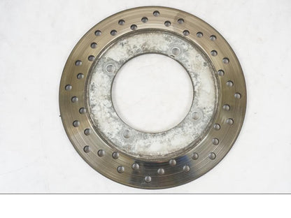 Snett uppifrån på Bromsskiva från en Honda CB 750 -1996 motorcykel.