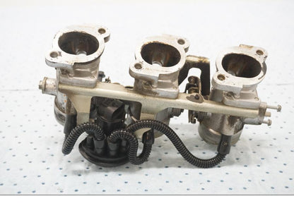 Höger sida på Spjällhus från en Triumph Tiger -2001 motorcykel.