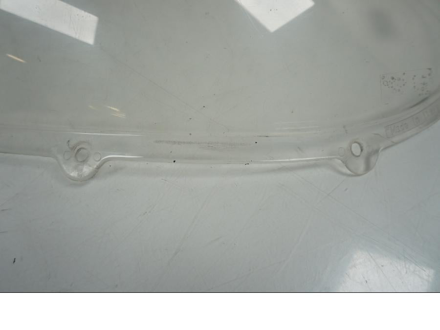 Baksidan på Vindruta från en Aprilia RS 250 -1998 motorcykel.