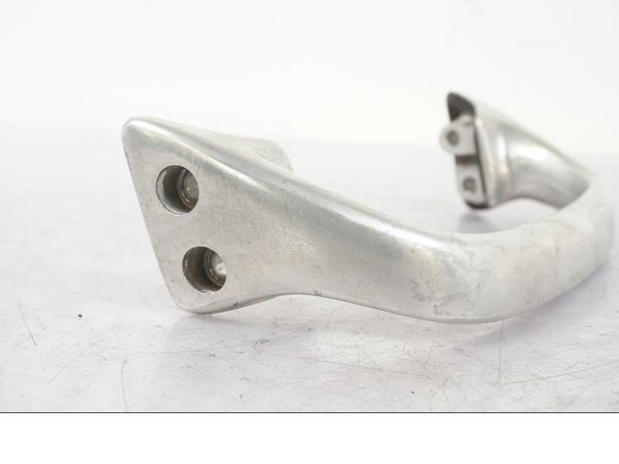Vänster sida på Passagerarhandtag från en Honda CB 750 -1996 motorcykel.