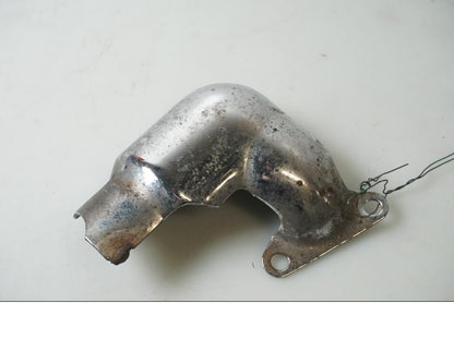 Framsidan på Värmeskydd från en Yamaha XVS 650 -1998 motorcykel.