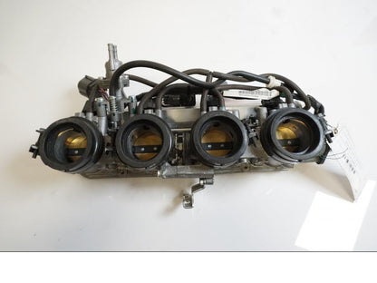 Framsidan på Spjällhus från en Honda CBR 1100 XX -2006 motorcykel.