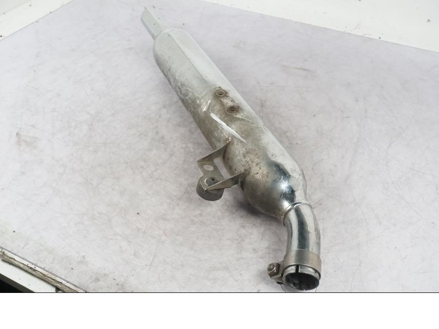 Snett uppifrån på Ljuddämpare från en Triumph Bonneville -2012 motorcykel.