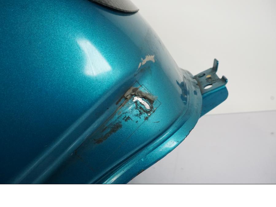 Vänster sida på Bensintank från en Honda VFR 750 -1994 motorcykel.