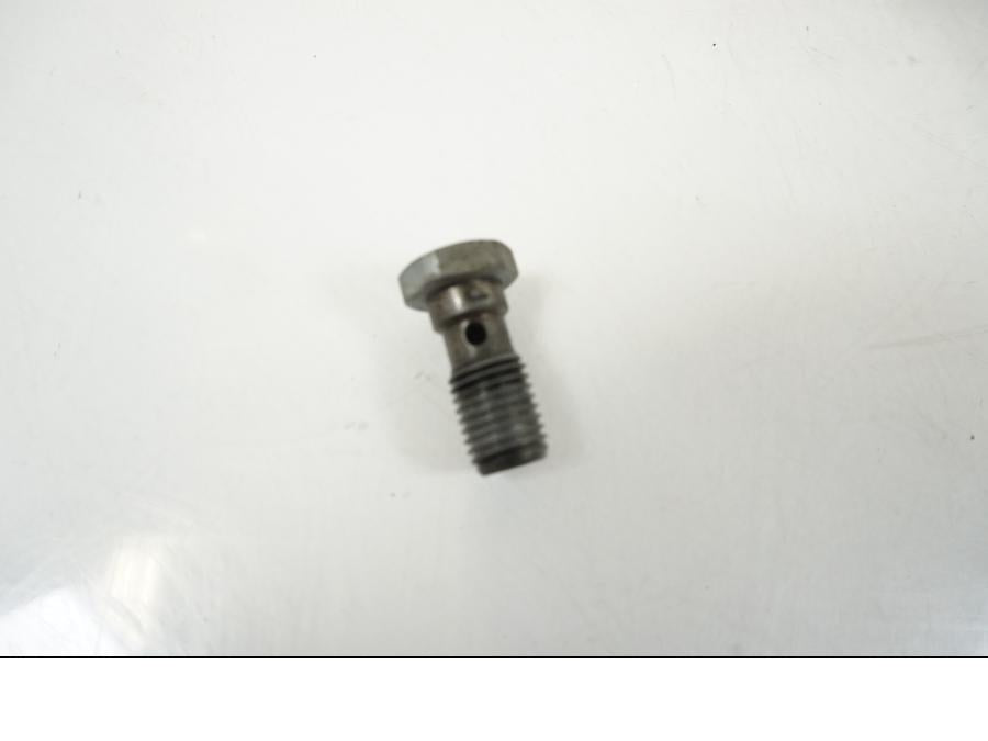 Baksidan på Bromshuvudcylinder från en Triumph Speed Triple -2009 motorcykel.