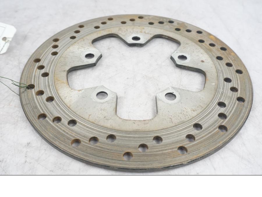 Höger sida på Bromsskiva från en Suzuki SV 650 -1999 motorcykel.