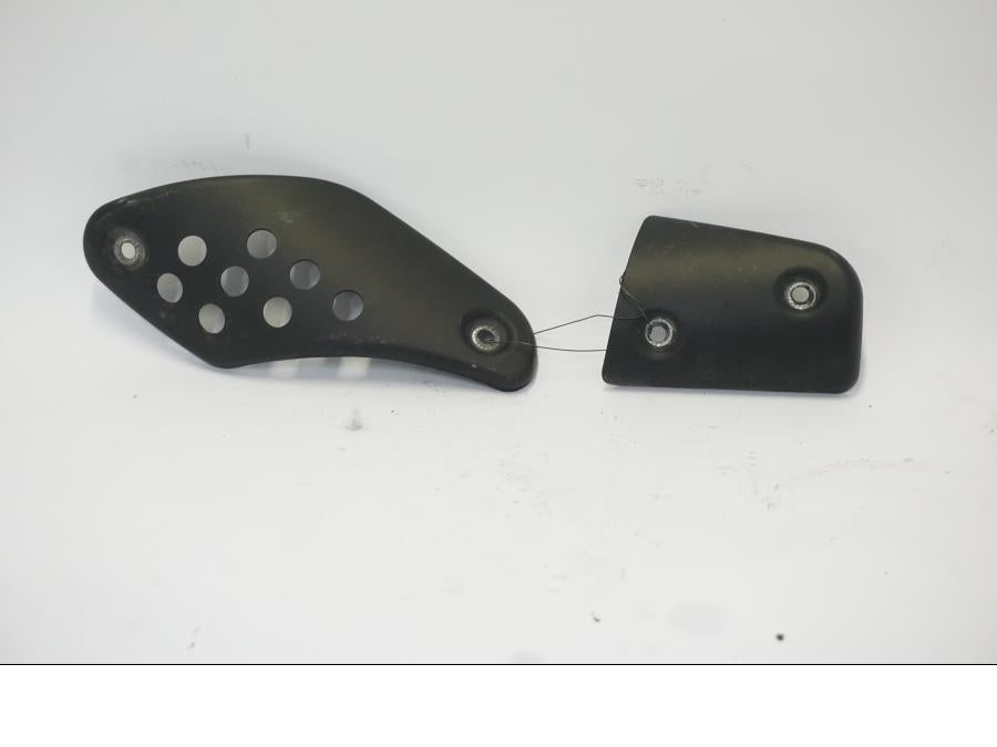 Framsidan på Värmeskydd från en BMW G 650 GS -2011 motorcykel.