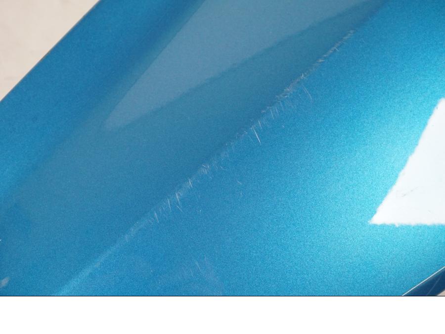 Baksidan på Sidkåpa från en BMW C400X -2018 motorcykel.